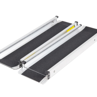 A portable wheelchair ramp with textured, non-slip surfaces is lying flat, displaying extendable metal rails on a plain white background.