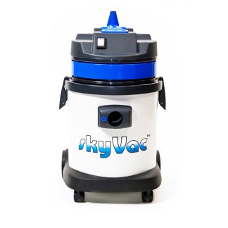 skyVac Internal 27Vacuum cleaner with white and blue body labeled "skyVac," standing upright on wheels against a plain white background.
