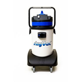 Vacuum cleaner stands on a black base with wheels; labeled "skyVac" on the white body and features a blue top in a plain studio environment.