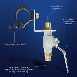 A metal valve assembly with a clamp for scaffolding features labeled parts: a hose outlet to skyWash®, a pressure lever, and a scaffold clamp, designed for roof cleaning support.